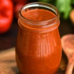 Homemade enchilada sauce in a bowl, perfect for enchiladas and Mexican dishes.