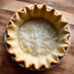 Perfectly parbaked pie crust ready for filling and baking.