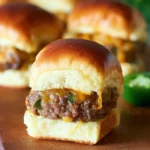 Delicious jalapeno cheddar sliders on a serving platter