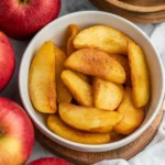 Deliciously cooked steamed apples with a sprinkle of cinnamon