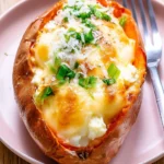 High Protein Cheese Stuffed Sweet Potato with melted cheese filling