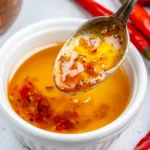 Bottle of Rachel's Sweet Chili Sauce with a spicy and sweet flavor